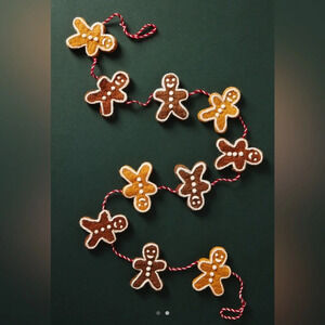 Anthropologie gingerbread men christmas garland wool decor holidays neutral home